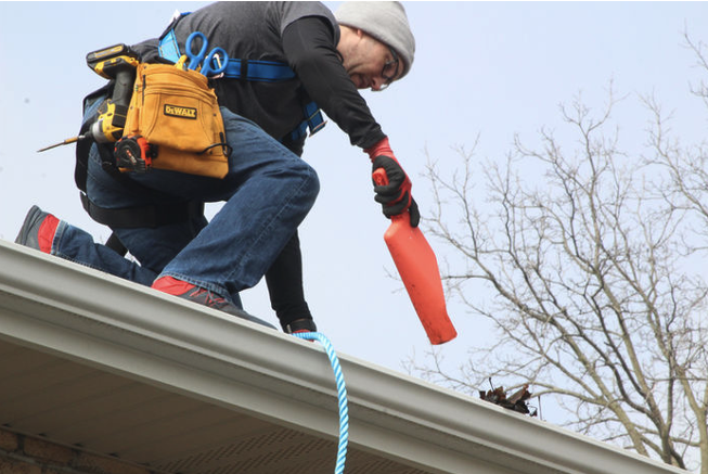 Gutter Protect technician working